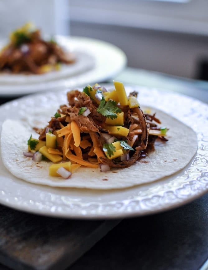 Crockpot BBQ Beer Pulled Pork Tacos with Crispy Onion Straws and Mango Salsa I howsweeteats.com Crockpot BBQ Beer Pulled Pork Tacos with Crispy Onion Straws and Mango Salsa I howsweeteats.com