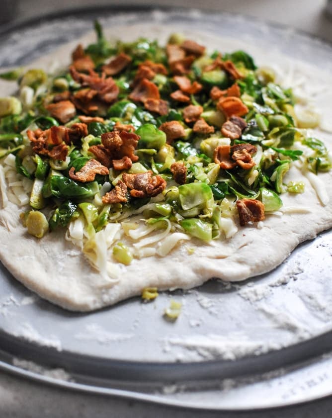 Cast Iron Skillet Brussels Sprouts Bacon Pizza I howsweeteats.com Cast Iron Skillet Brussels Sprouts Bacon Pizza I howsweeteats.com