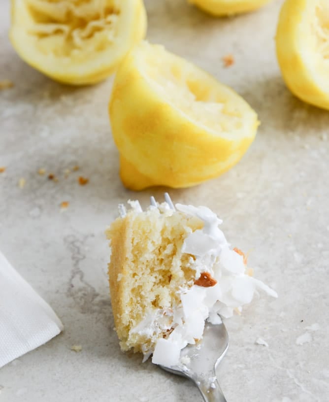 Easy Lemon Cake with Marshmallow Frosting + Toasted Coconut I howsweeteats.com Easy Lemon Cake with Marshmallow Frosting + Toasted Coconut I howsweeteats.com