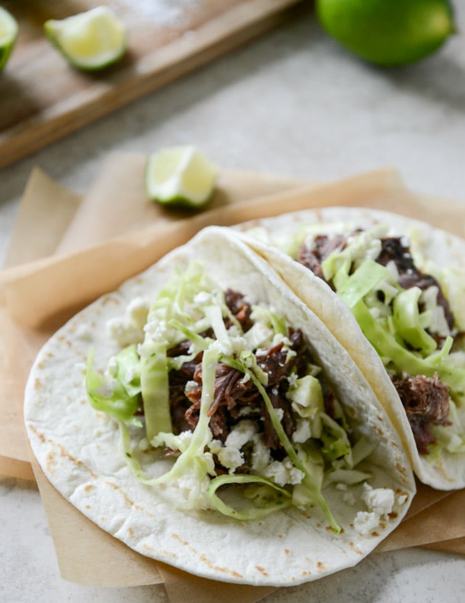 Crockpot Short Rib Tacos with Salted Lime Cabbage and Queso Fresco I howsweeteats.com Crockpot Short Rib Tacos with Salted Lime Cabbage and Queso Fresco I howsweeteats.com