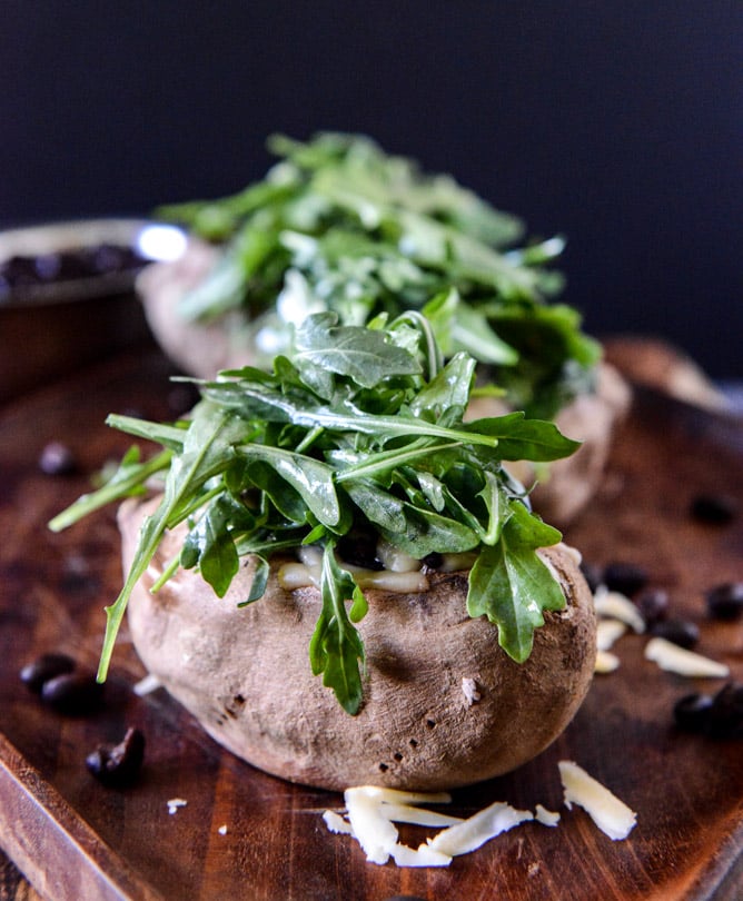 Cheesy Black Bean Stuffed Sweet Potatoes with Arugula + Poached Eggs I howsweeteats.com Cheesy Black Bean Stuffed Sweet Potatoes with Arugula + Poached Eggs I howsweeteats.com