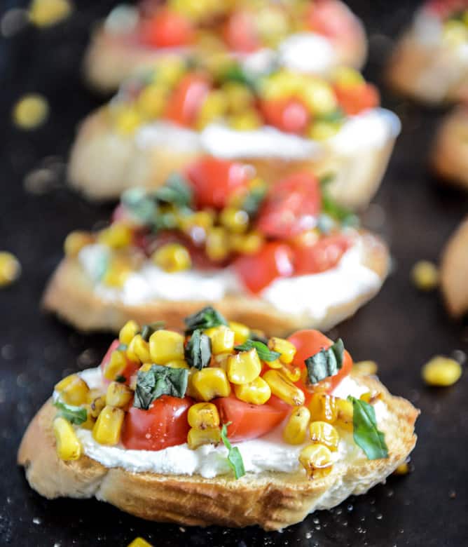 Summer Crostini with Whipped Roasted Garlic Goat Cheese I howsweeteats.com Summer Crostini with Whipped Roasted Garlic Goat Cheese I howsweeteats.com