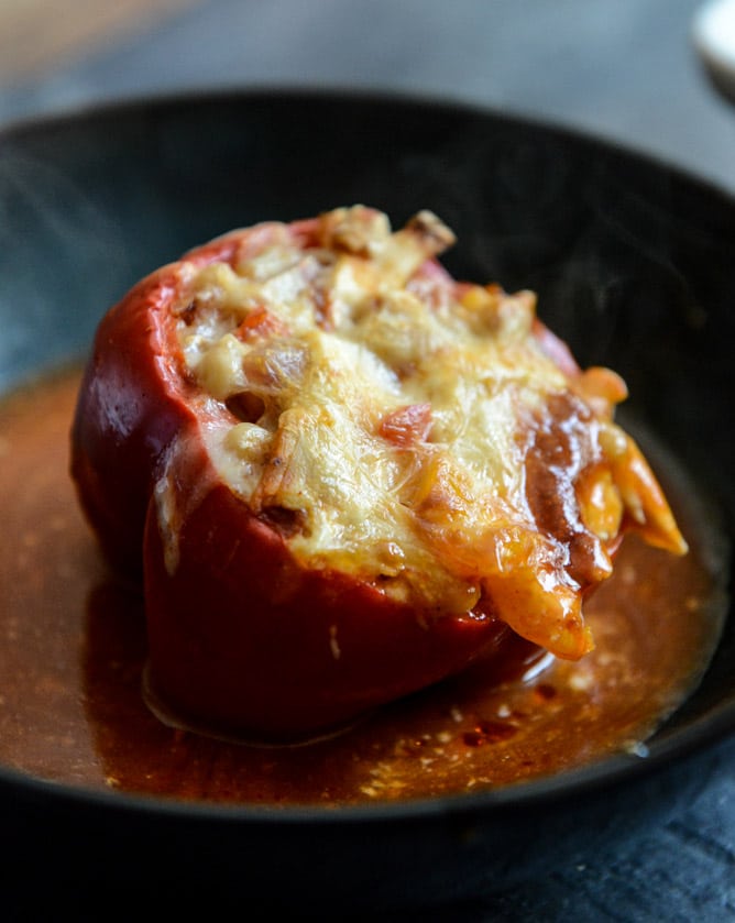 White Bean + Chicken Enchilada Stuffed Peppers I howsweeteats.com White Bean + Chicken Enchilada Stuffed Peppers I howsweeteats.com