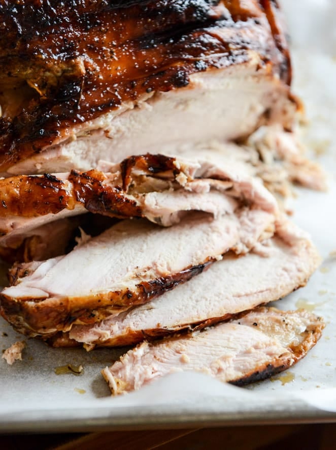 this applewood smoked turkey is prepped with a maple bourbon brine and served with a cider bourbon gravy! I howsweeteats.com this applewood smoked turkey is prepped with a maple bourbon brine and served with a cider bourbon gravy! I howsweeteats.com