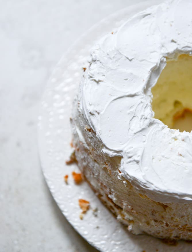 Angel Food Layer Cake with Whipped Coconut Cream and Grapefruit Syrup I howsweeteats.com Angel Food Layer Cake with Whipped Coconut Cream and Grapefruit Syrup I howsweeteats.com