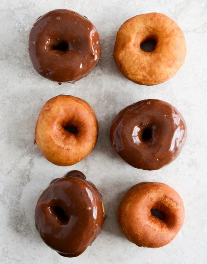 Crunchy Kettle Chip Chocolate Frosted Raised Donuts I howsweeteats.com Crunchy Kettle Chip Chocolate Frosted Raised Donuts I howsweeteats.com
