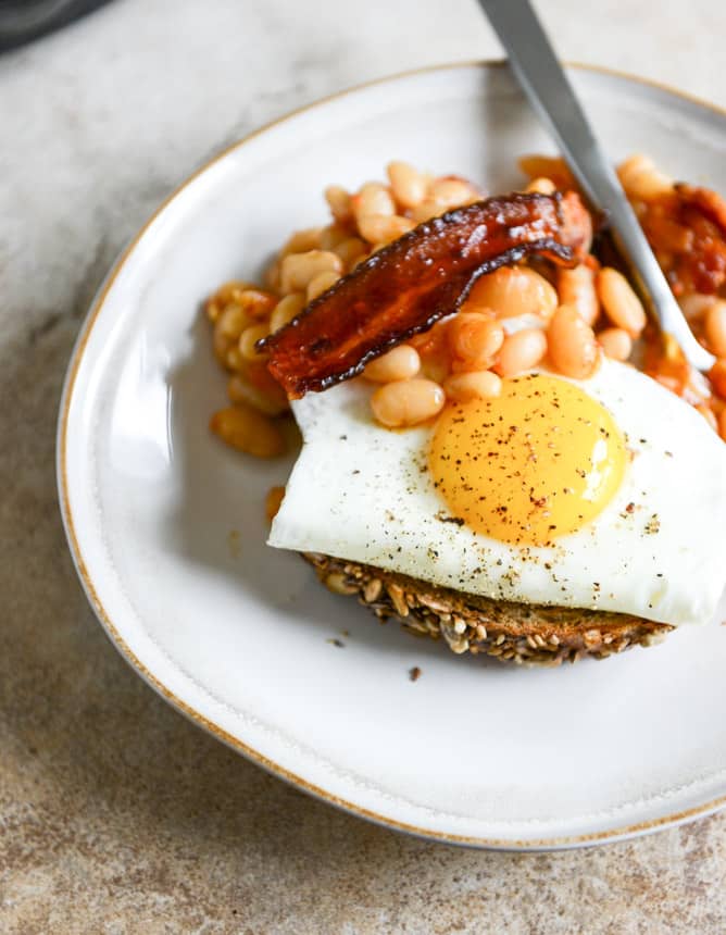 Skillet Baked White Beans. (on toast!) I howsweeteats.com