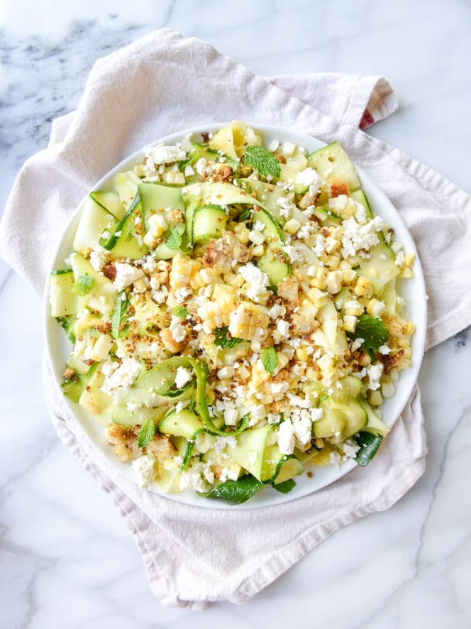 marinated zucchini feta salad with fresh corn and toasted pistachio breadcrumbs I howsweeteats.com
