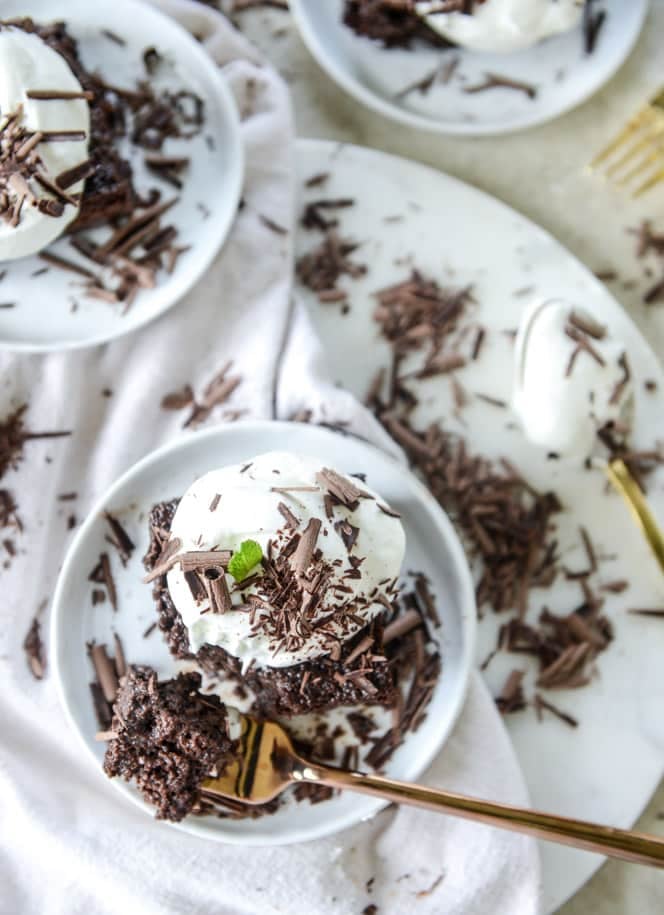 This chocolate tres leches cake is a spin on the classic tres leches. Three milks, one being chocolate milk, soak into the fudgiest cake ever! I howsweeteats.com