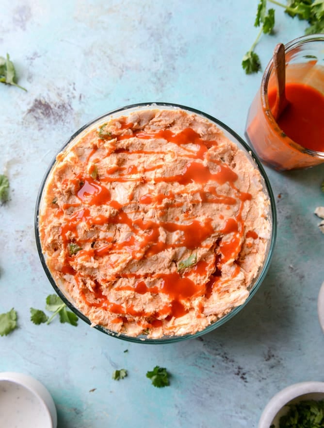 layered buffalo chicken dip I howsweeteats.com