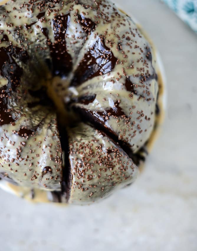 chocolate fudge cake with caramel cream icing I howsweeteats.com