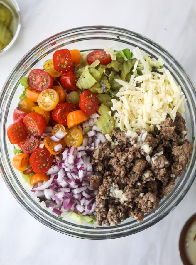 cheeseburger chopped salad I howsweeteats.com #cheeseburger #chopped #salad #dill #pickle #dressing