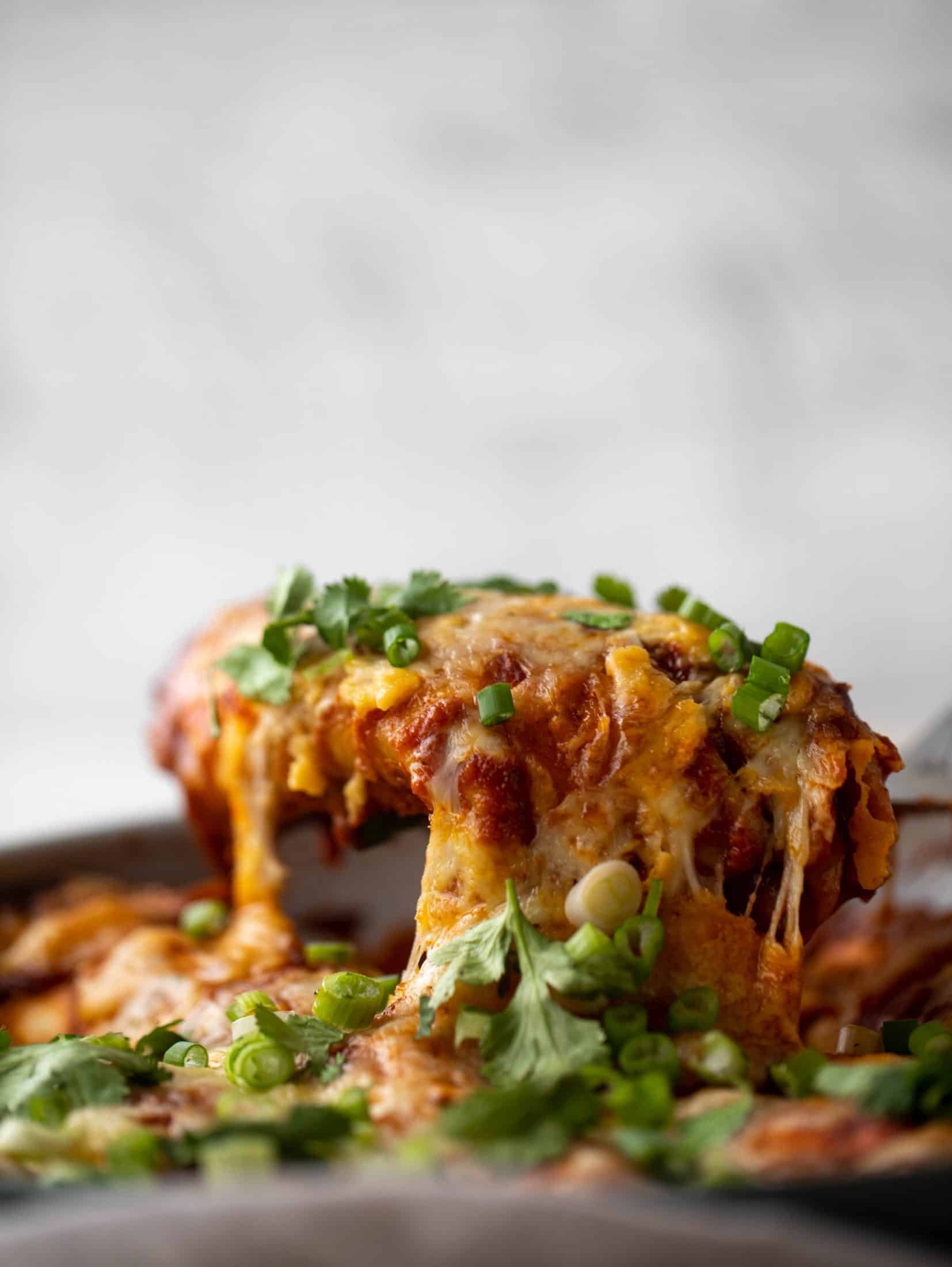 Chipotle chicken skillet enchiladas are loaded with flavor and come together so quickly! They are the perfect spicy weeknight meal.