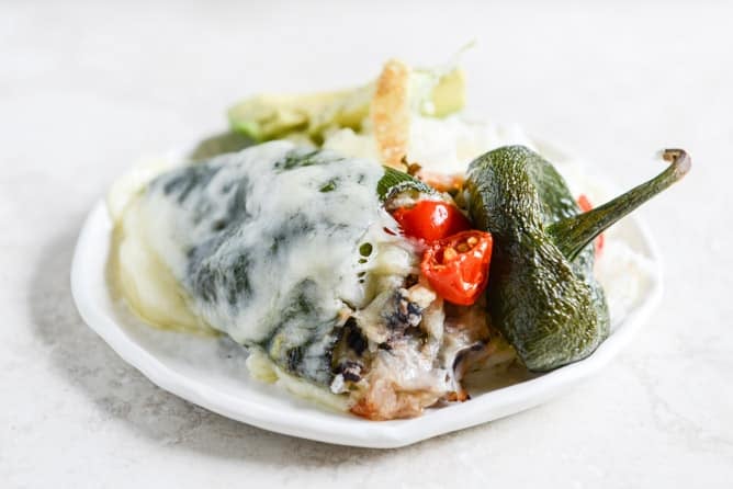 cheese smothered stuffed poblanos I howsweeteats.com