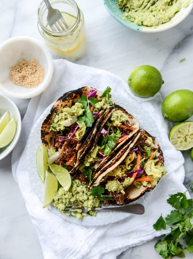 slow cooker sweet + spicy short rib tacos with sesame guacamole I howsweeteats.com