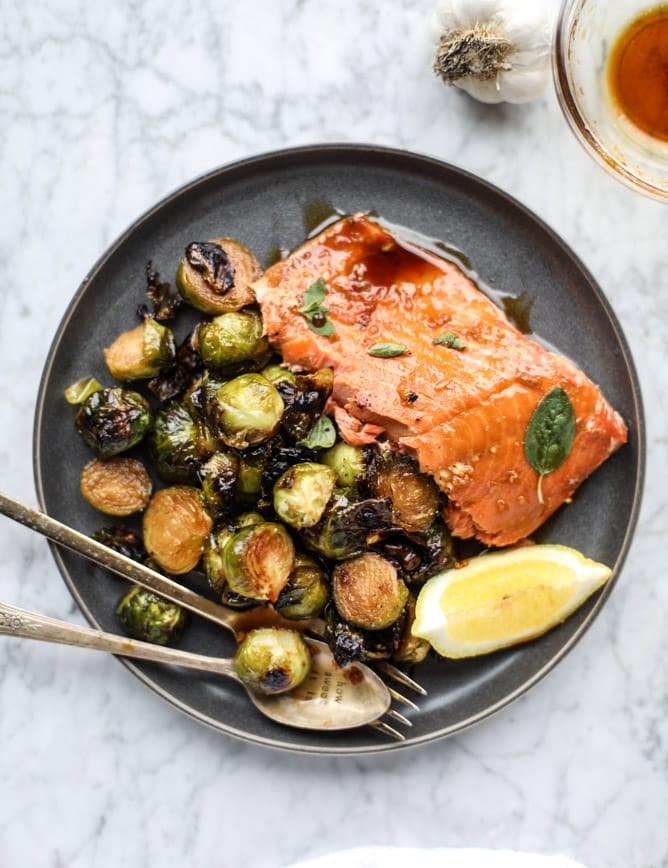 sheet pan honey garlic salmon and brussels I howsweeteats.com #sheetpan #salmon #honeygarlic #brusselssprouts