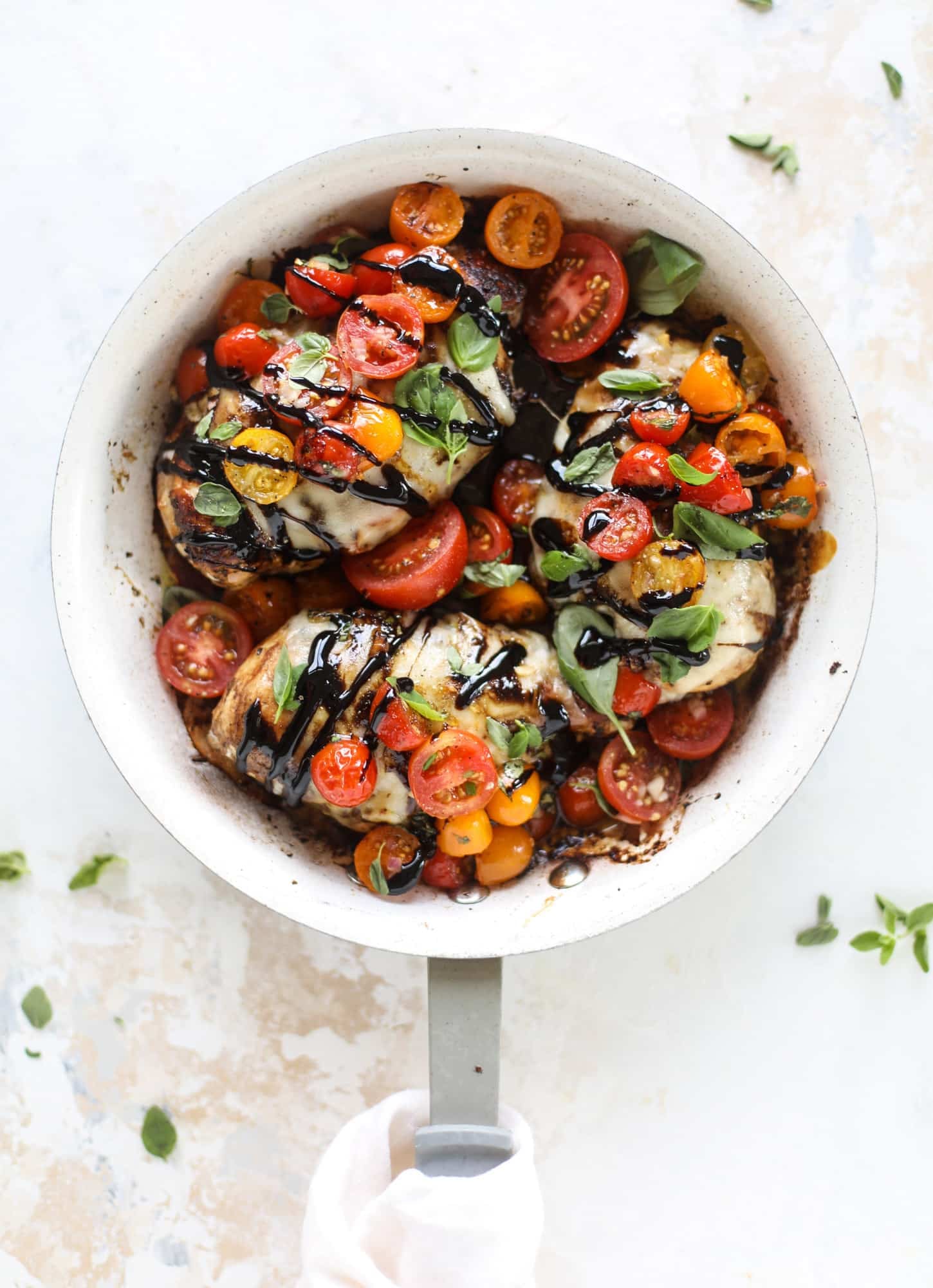 This bruschetta chicken is the perfect summer garden meal! Juicy, flavorful chicken topped with fresh tomatoes, garlic, basil and balsamic glaze, along with a touch of cheese. Served with pasta, it's an incredible meal. I howsweeteats.com #bruschetta #chicken #pasta #tomatoes #basil 