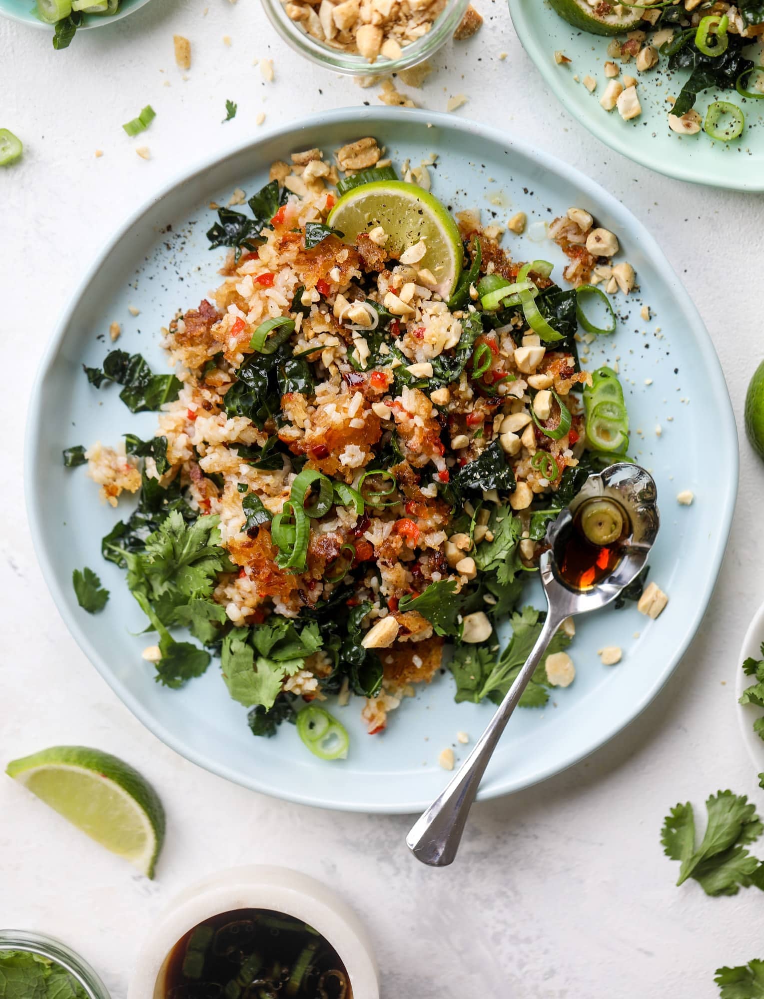 This crispy rice salad is the best lunch I've had in ages! It's full of crunch and crisp, it's satisfying and has lots of green kale so we get our veg in. The crispy rice salad can be a meal, you can add beans or rice or it can even be a side dish. I howsweeteats.com #rice #salad #vegetarian #crispy #kale