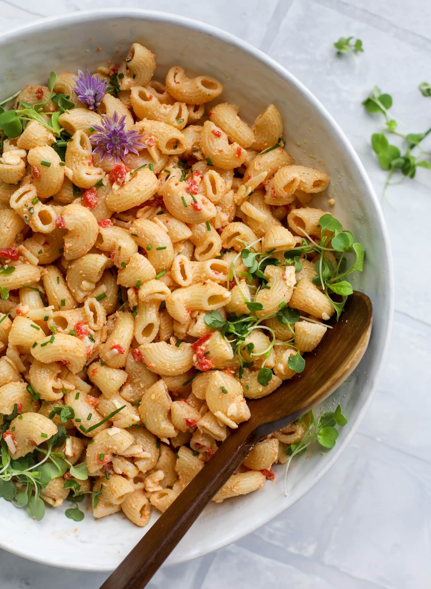 This pimento cheese pasta salad is the perfect summer side dish! All the flavor of pimento cheese and all the comforts of pasta salad, in one bowl!