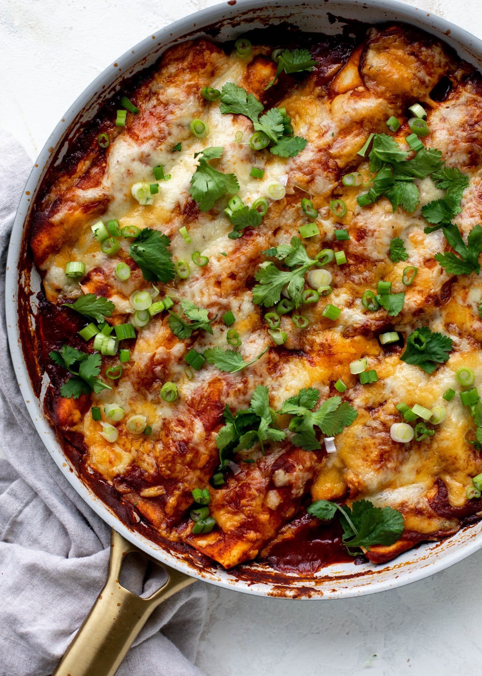 Chipotle chicken skillet enchiladas are loaded with flavor and come together so quickly! They are the perfect spicy weeknight meal.
