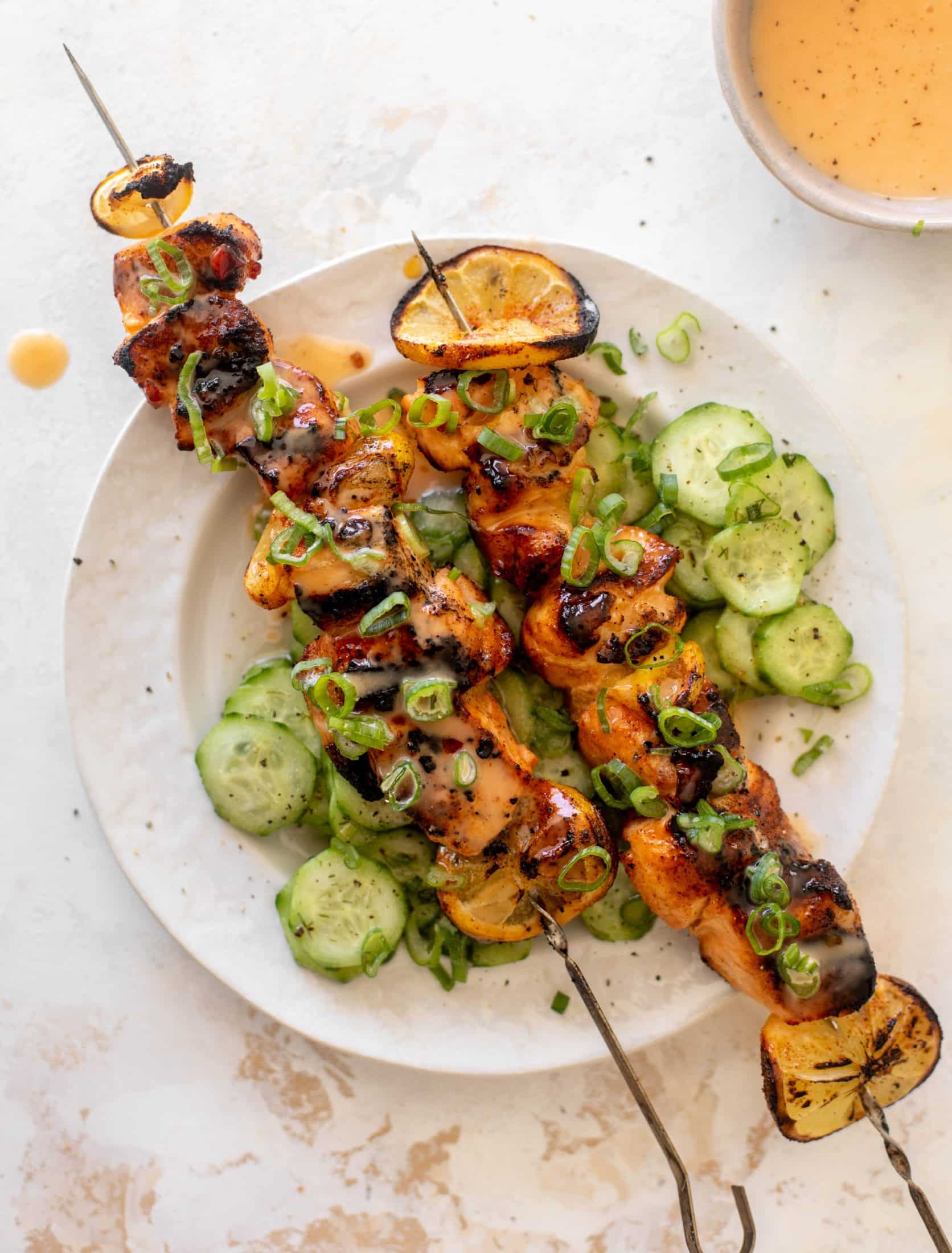 grilled bang bang salmon with cucumber salad