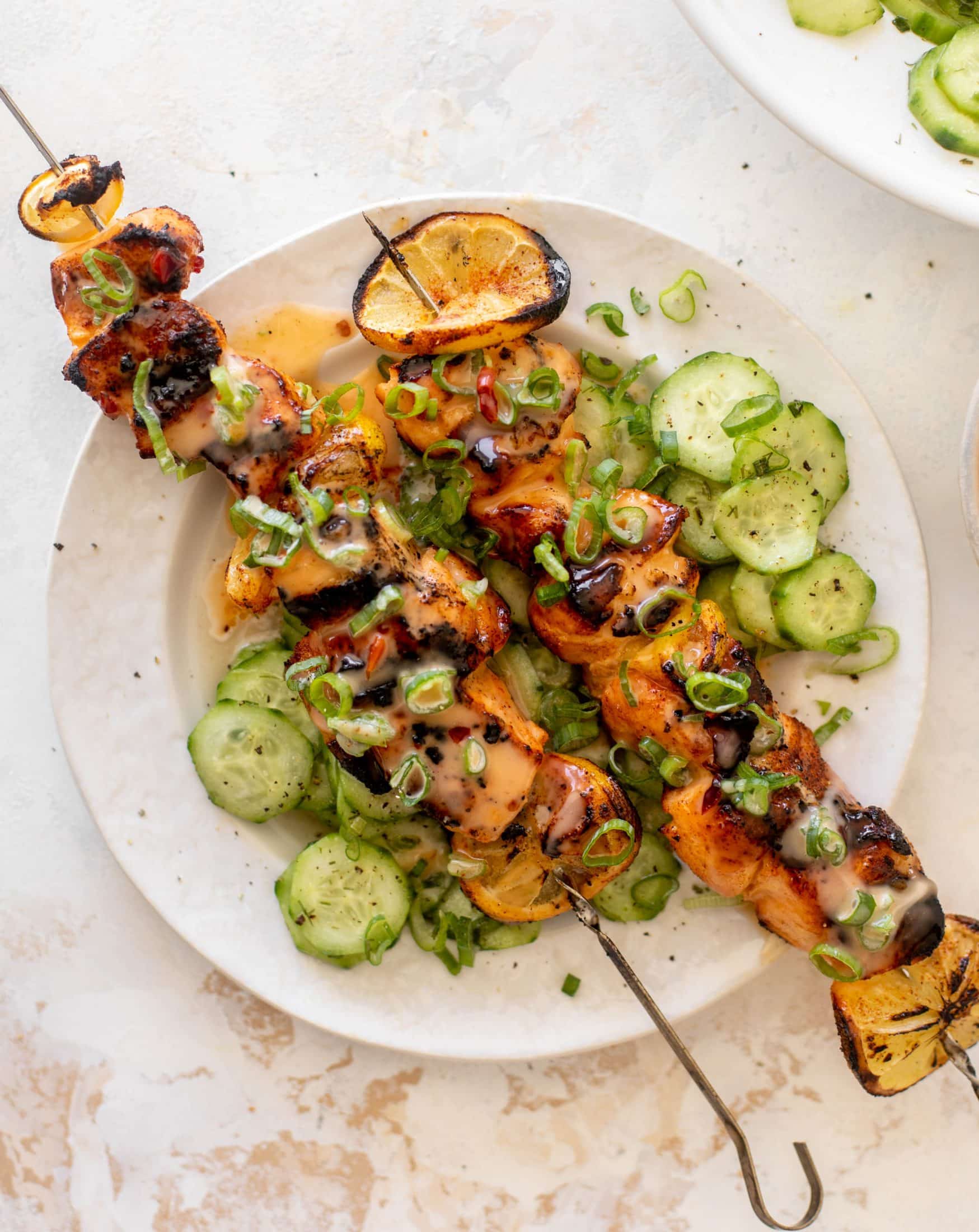 grilled bang bang salmon with cucumber salad