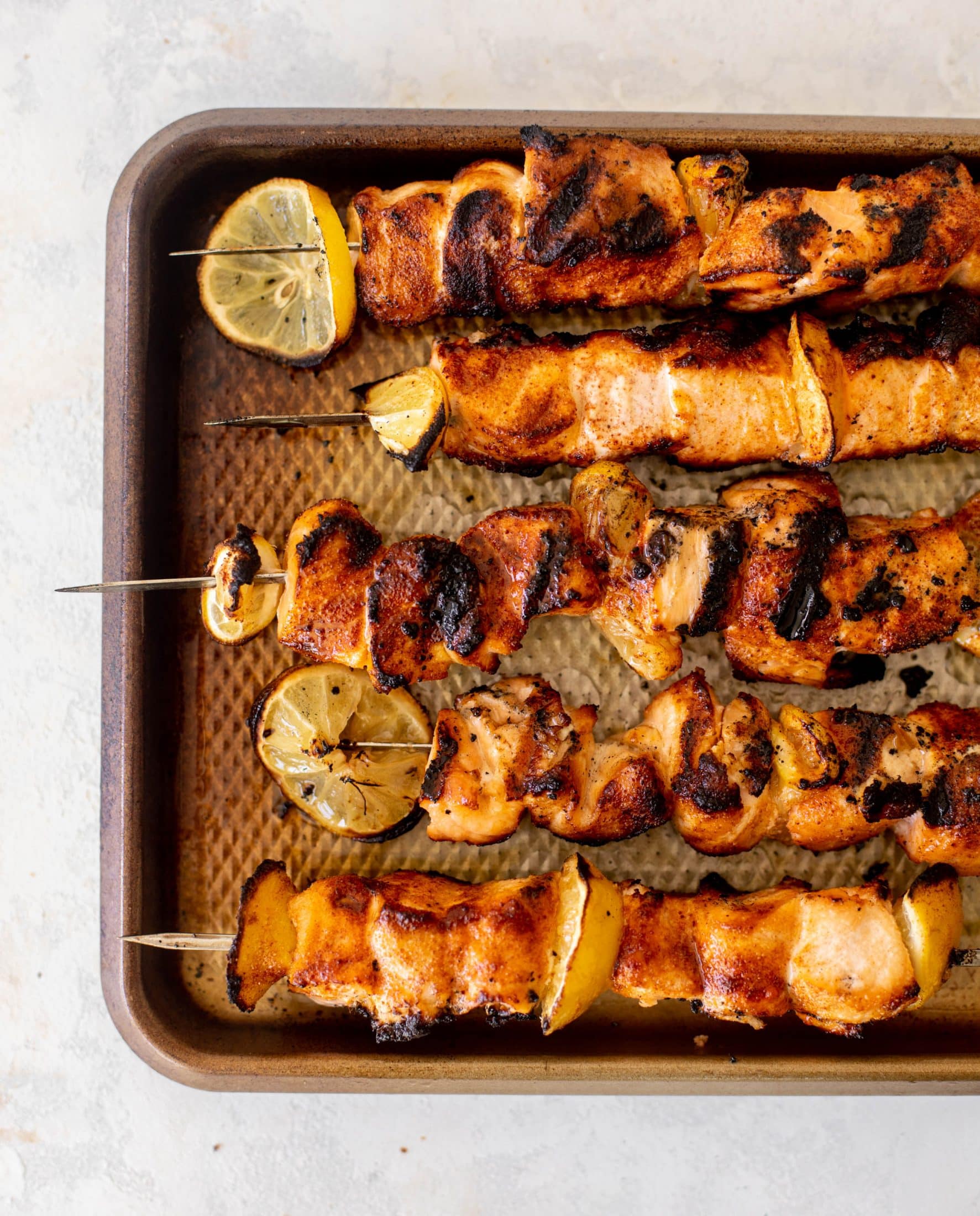 grilled bang bang salmon with cucumber salad