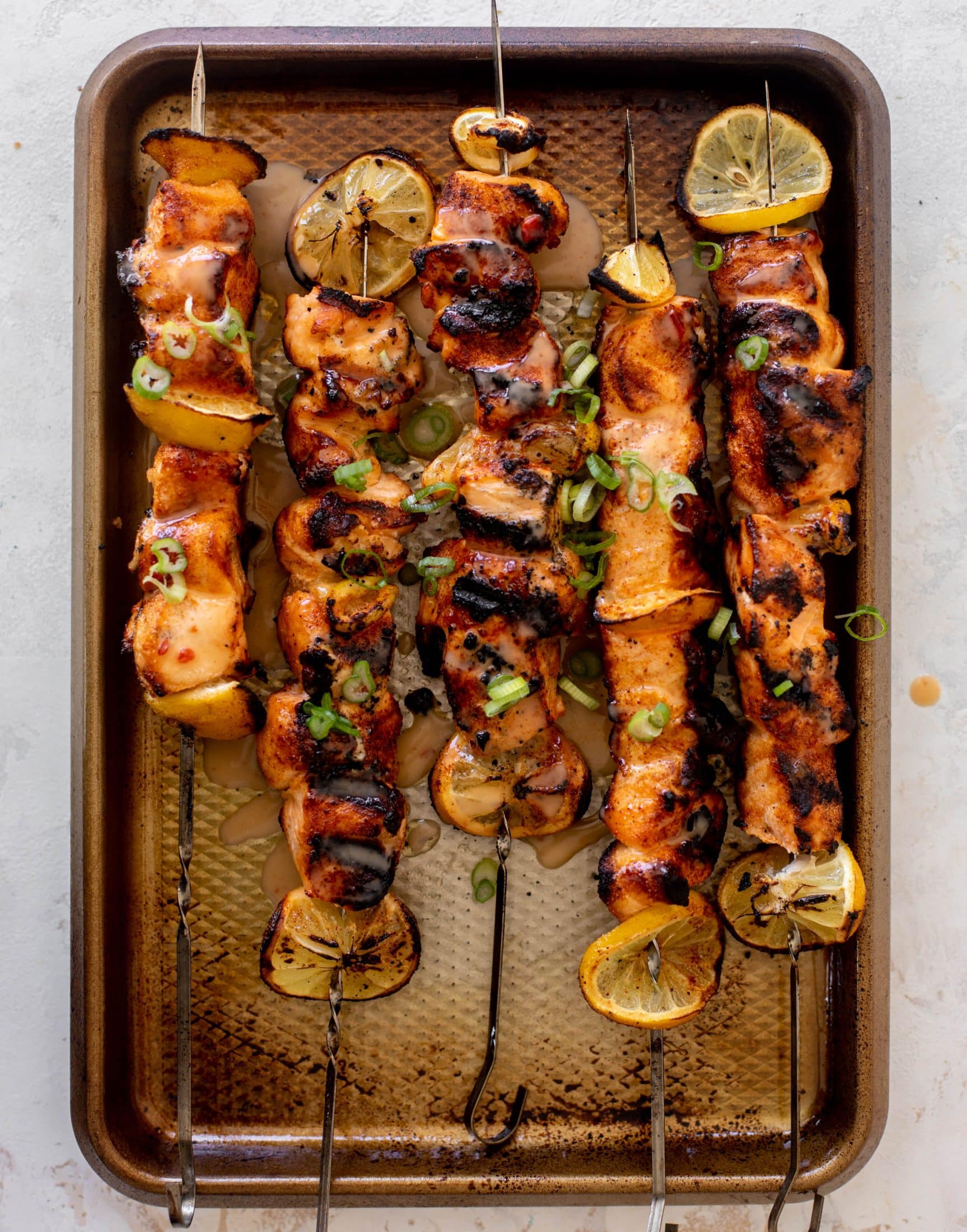 grilled bang bang salmon with cucumber salad