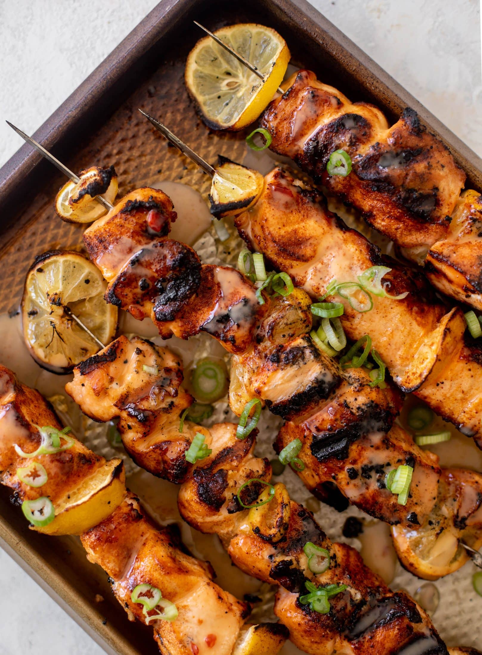 grilled bang bang salmon with cucumber salad