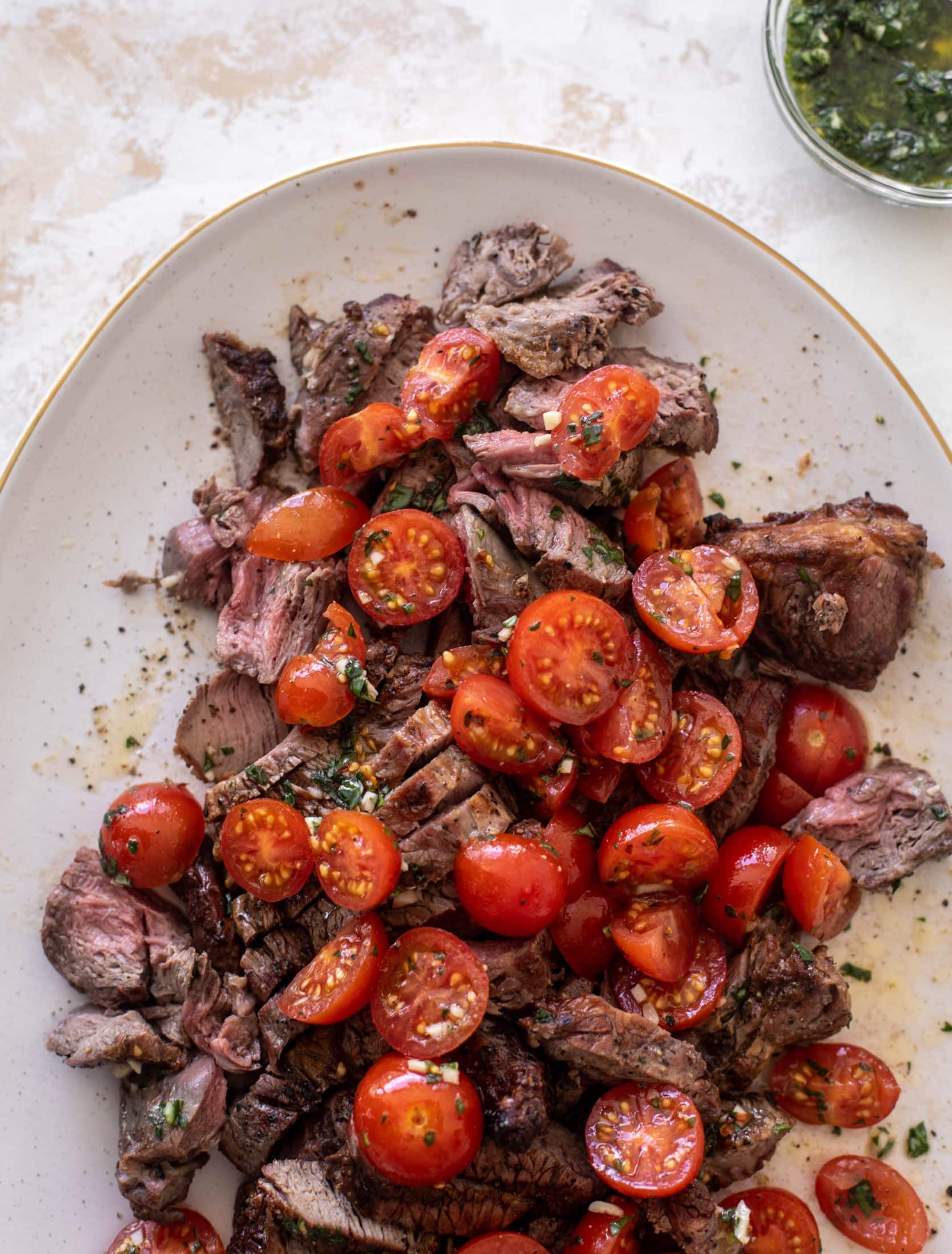 grilled steak with spicy marinated tomatoes